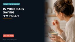 A baby in a high chair looking toward a parent offering a spoon during a calm kitchen mealtime.
