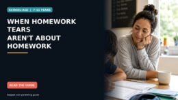 A school-age child looking upset over a worksheet while a parent sits nearby offering calm support.