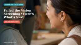 Parent and school-age child discussing next steps after a vision screening result.