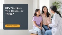 An 11-year-old sitting calmly with a caregiver while preparing for an HPV vaccination appointment