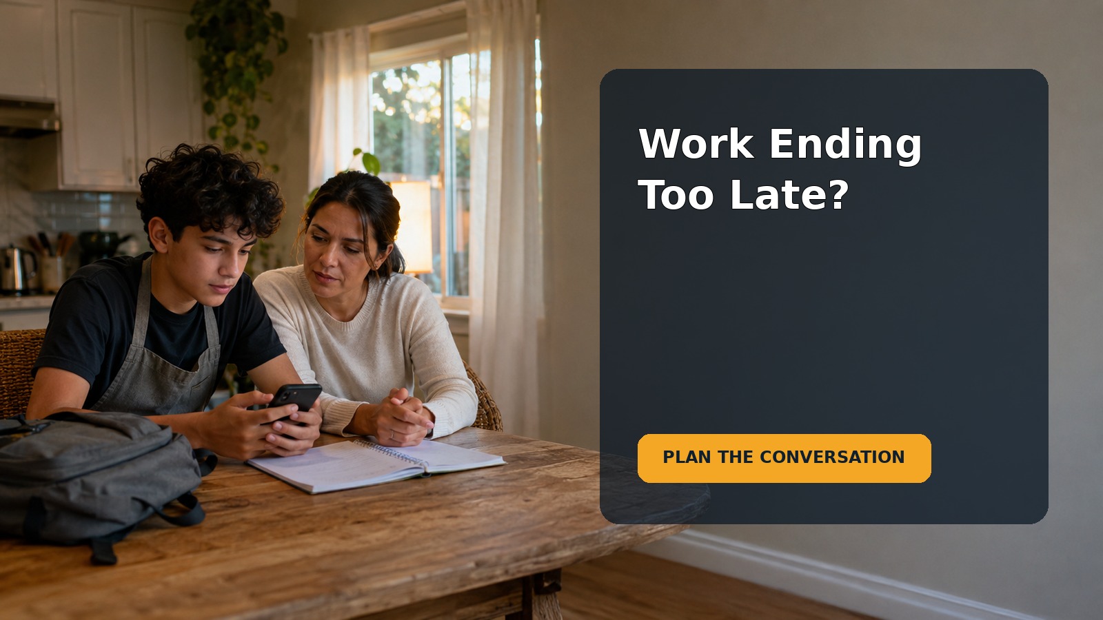 A teenager and parent calmly reviewing a late work schedule at a kitchen table