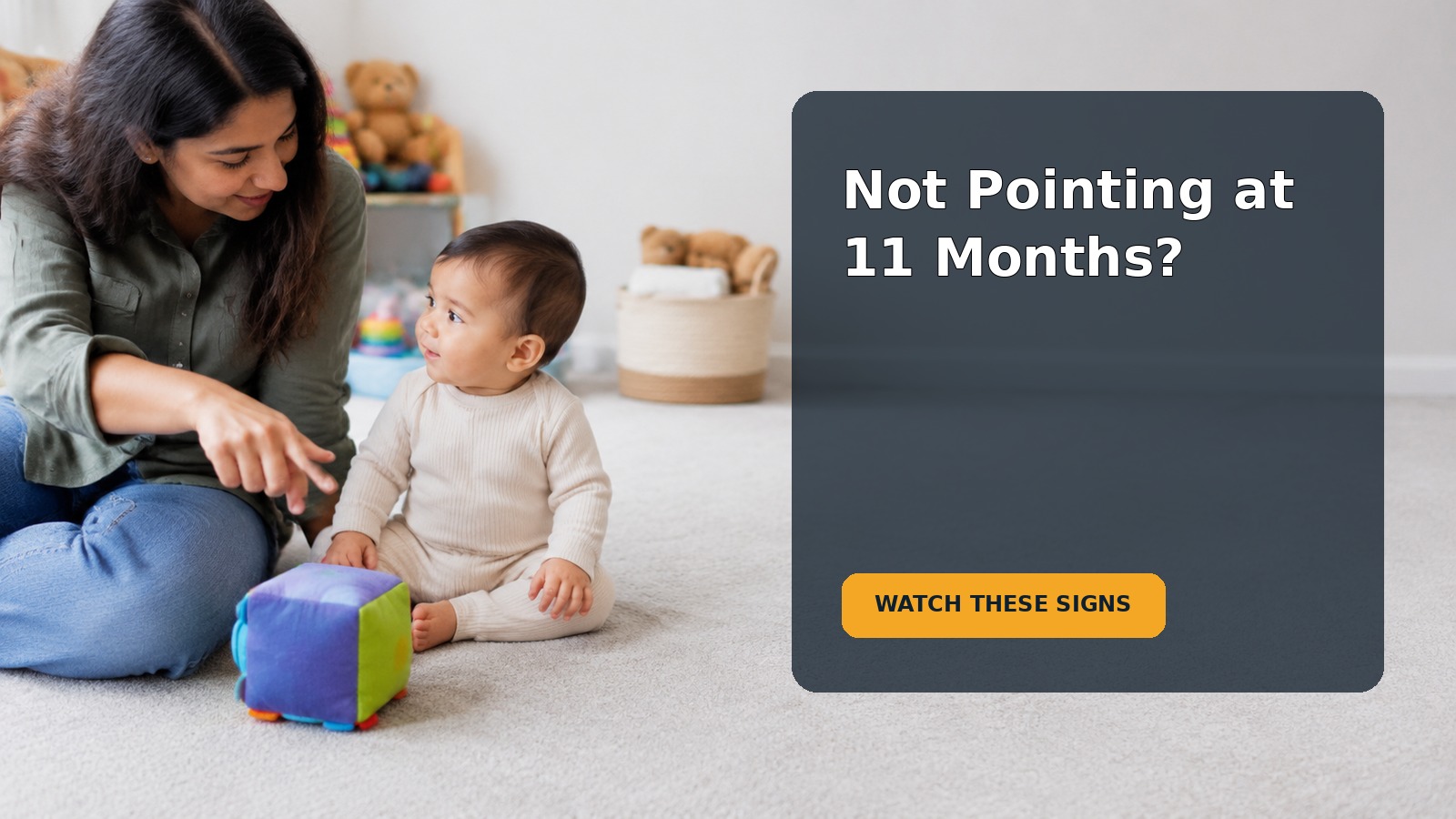 A parent and an 11-month-old baby sharing attention with a toy during floor play
