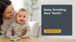 A caregiver calmly observes a nine-month-old baby with newly erupted teeth