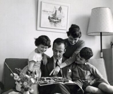 Parents and two children spending calm time together at home