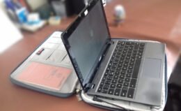Chromebook resting on a protective carry case.