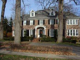 Exterior view of a family home, used as an editorial illustration for an article about preparing an older child to be home after school.