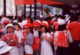 Schoolchildren on an outing, carrying backpacks