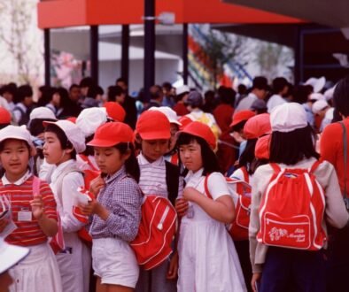 Schoolchildren on an outing, carrying backpacks