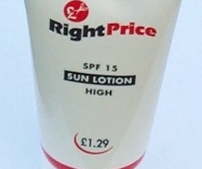 A bottle of SPF 15 sunblock, representing the sunscreen step in a simple tween skincare routine.
