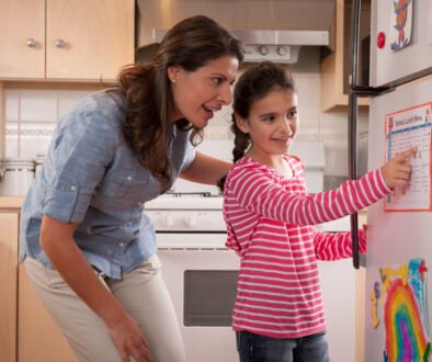 Parent and child talking at home, used as an editorial illustration for repairing after yelling.