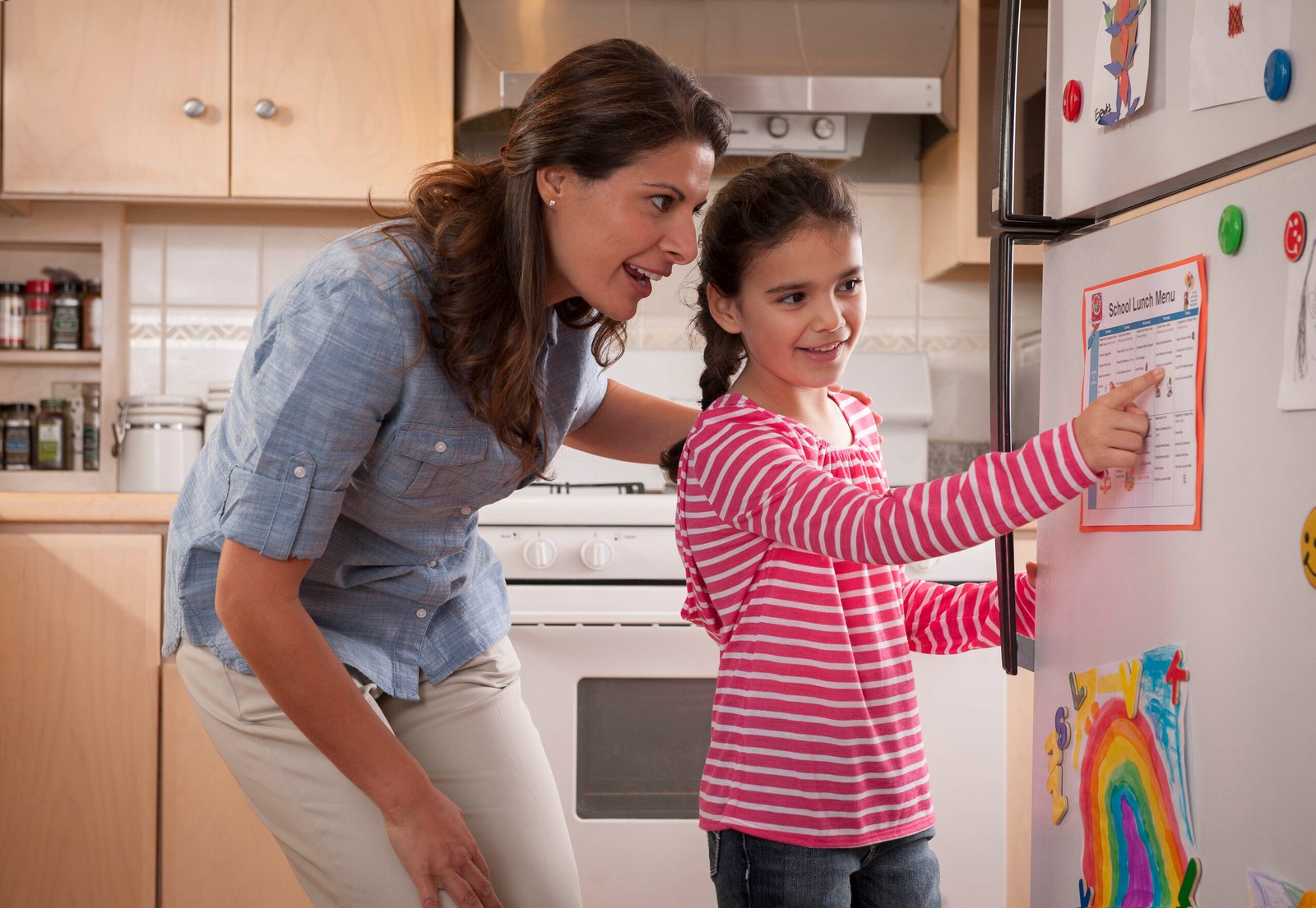 Parent and child talking at home, used as an editorial illustration for repairing after yelling.