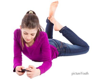 Teen using a smartphone