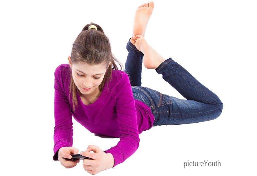 Teen using a smartphone