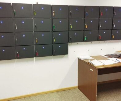 A row of locked firearm storage safes at a courthouse.